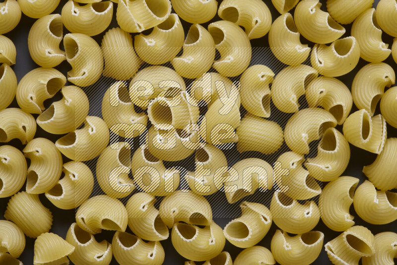 Pipe pasta on grey background