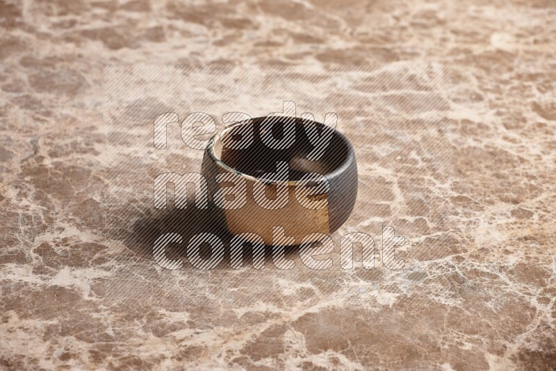 Multicolored Pottery Bowl on Beige Marble Flooring