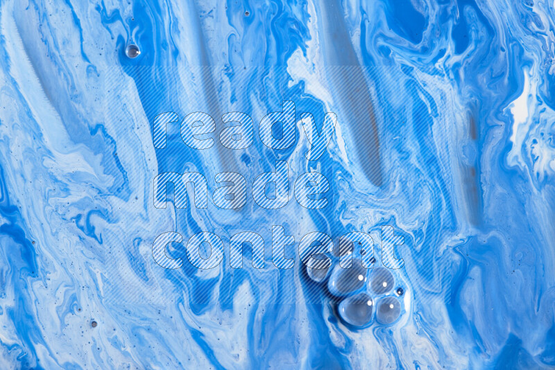 خلفية ملونة مع مزيج من ألوان الطلاء الأبيض والأزرق