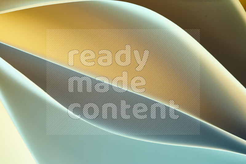 This image showcases an abstract paper art composition with paper curves in green and yellow gradients created by colored light