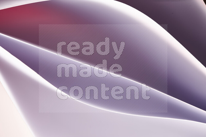 هذه الصورة تعرض تكوين فن الورق التجريدي مع منحنيات ورقية باللون الأبيض ودرجات دافئة مختلفة المكونه بواسطة الضوء الملون