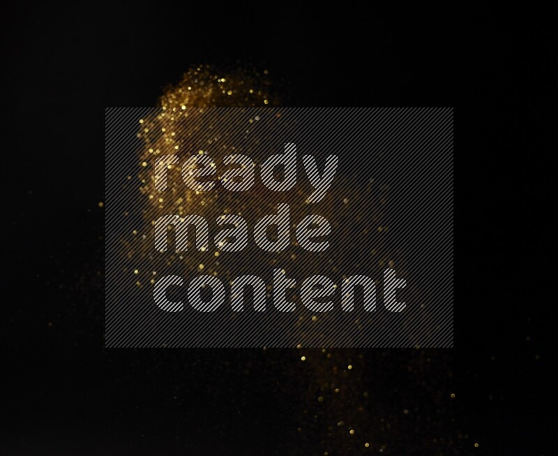 Gold glitter powder isolated on black background