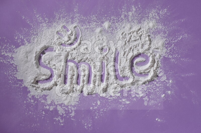 A word written with powder on purple background