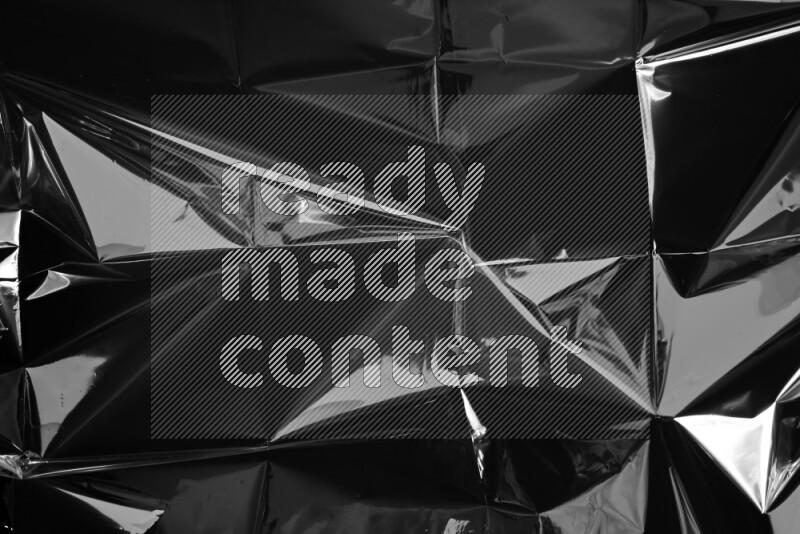 Plastic wrap texture on black background