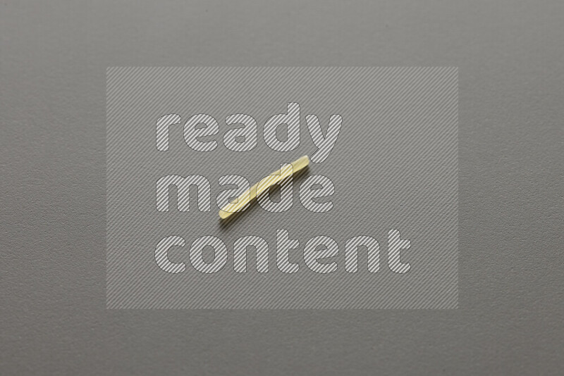 Vermicelli pasta on grey background