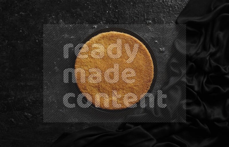 Konafa in different plates in a dark setup