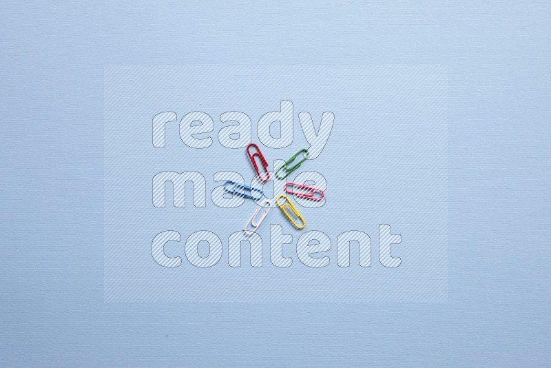 Different school supplies on blue background (back to school)