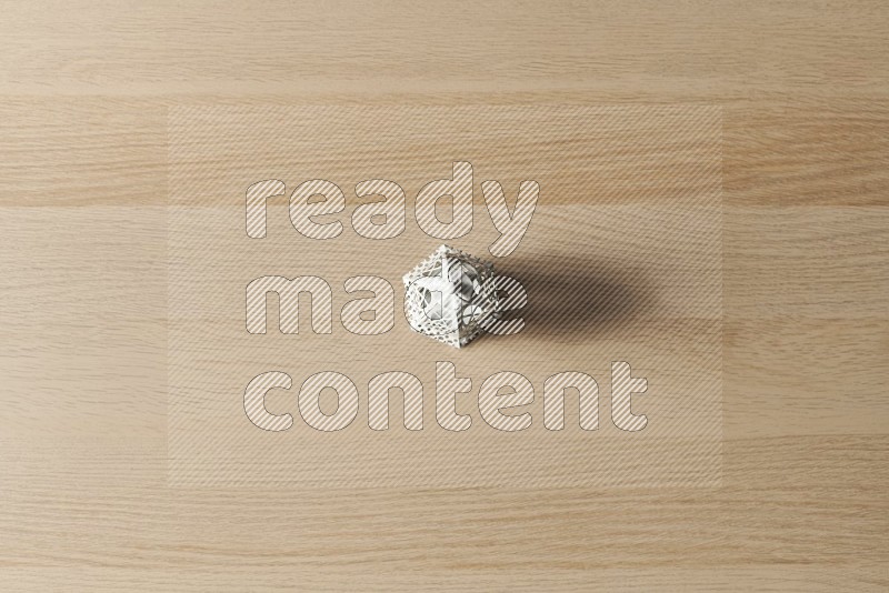 Top View Shot Of A Candle Lantern on Oak Wooden Flooring