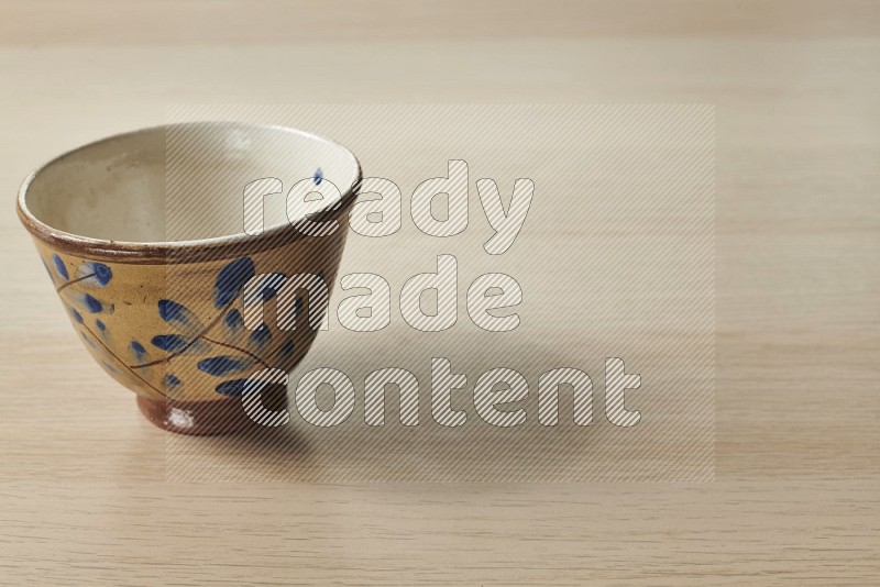 Decorative Pottery Bowl on Oak Wooden Flooring, 15 degrees