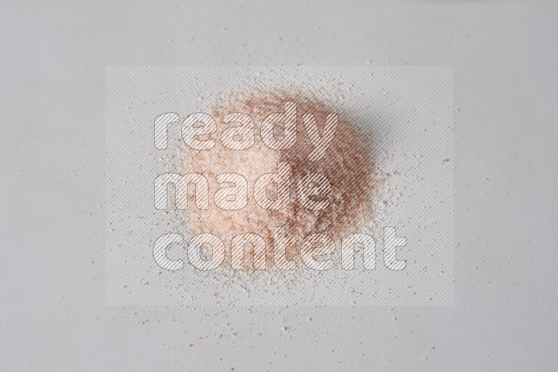 A bunch of fine himalayan salt on white background