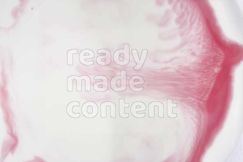 A close-up of abstract swirling patterns in red and white