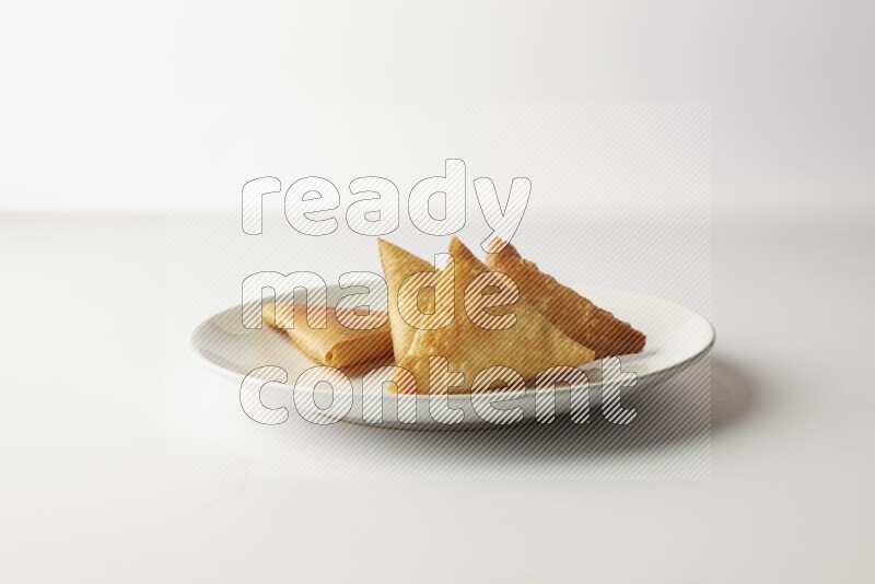 sambosas on a white background