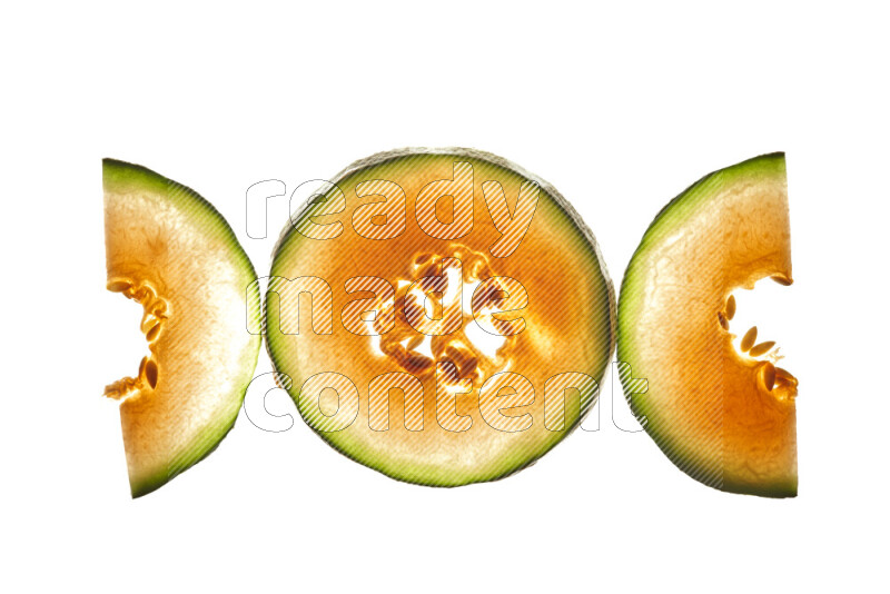Cantaloupe slices on illuminated white background