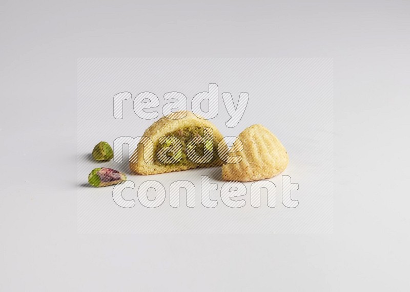 Half Maamoul filled with pistachio direct on white background