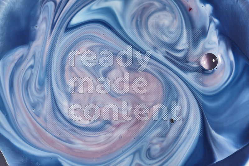 لقطة مقربة لأنماط دوامية باللون الأزرق والأحمر والأبيض