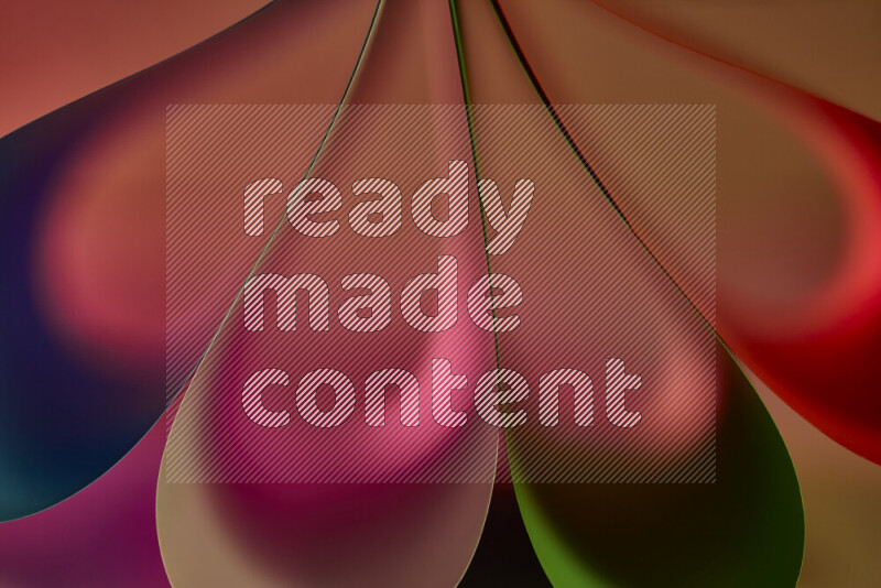 An abstract art piece displaying smooth curves in colorful gradients created by colored light