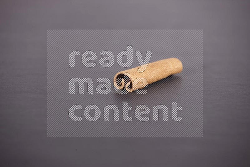 Cinnamon stick on black background