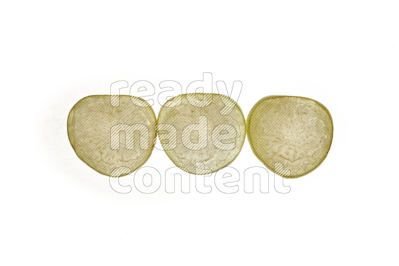 Plum slices on illuminated white background