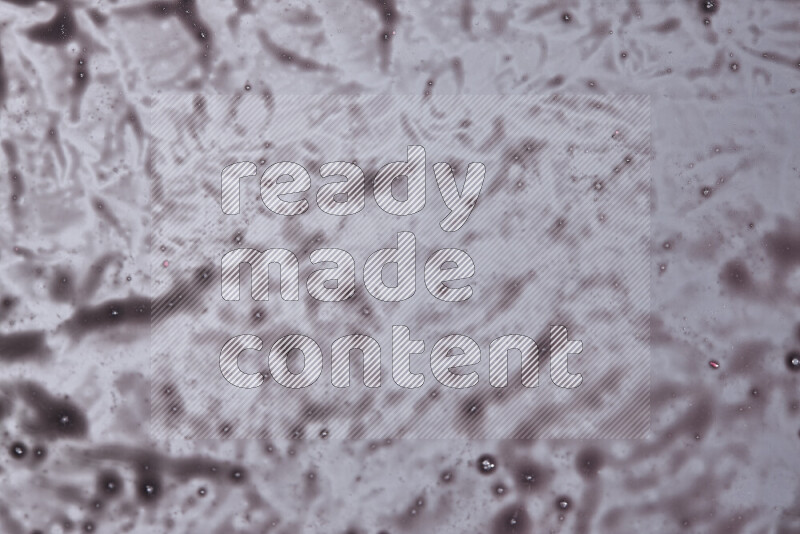 لقطات مقربة لأشكال مختلفة مرسومه باللون الأرجواني