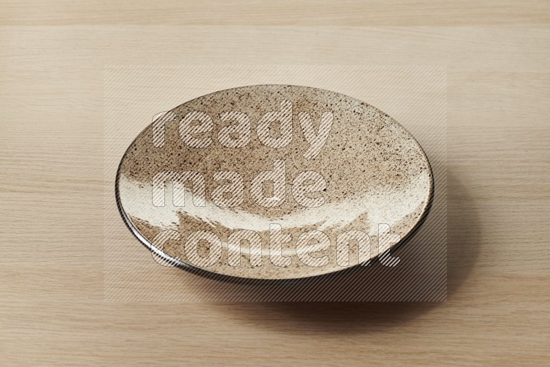 Beige Pottery Plate on Oak Wooden Flooring, 45 degrees