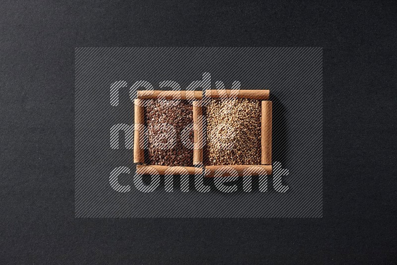 2 squares of cinnamon sticks full of mustard seeds and flaxseeds on black flooring