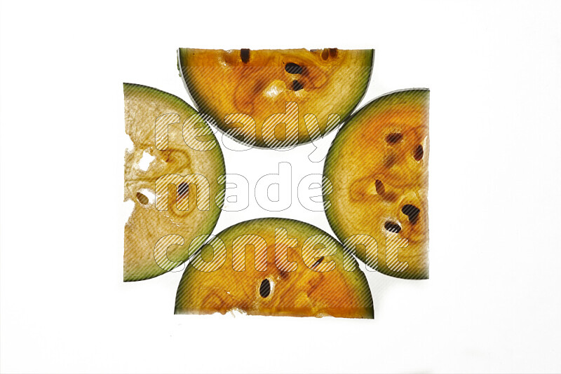 Watermelon slices on illuminated white background