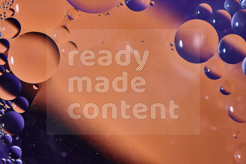 Close-ups of abstract oil bubbles on water surface in shades of orange and purple