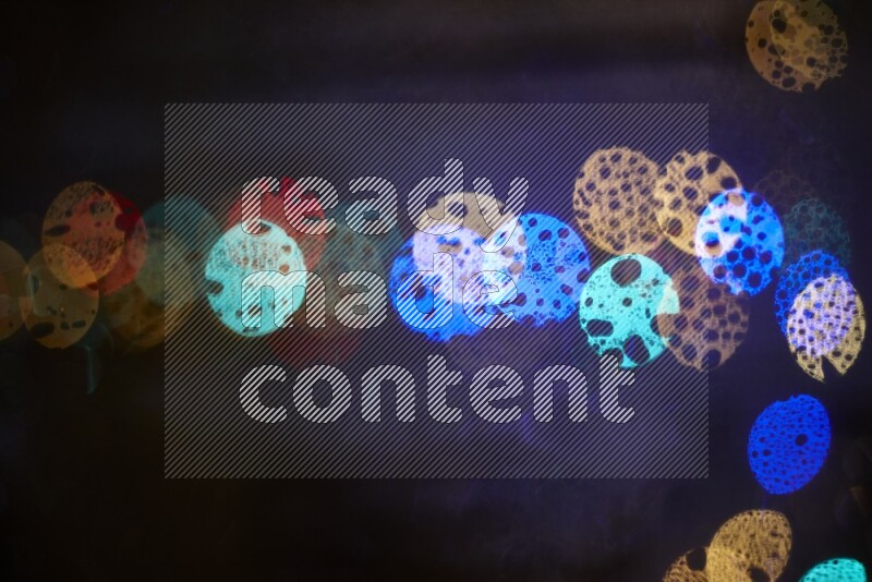 Bokeh light in multicolor with water drops