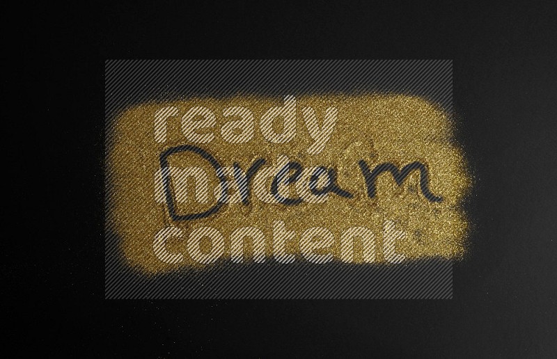 A word written with gold glitter on black background