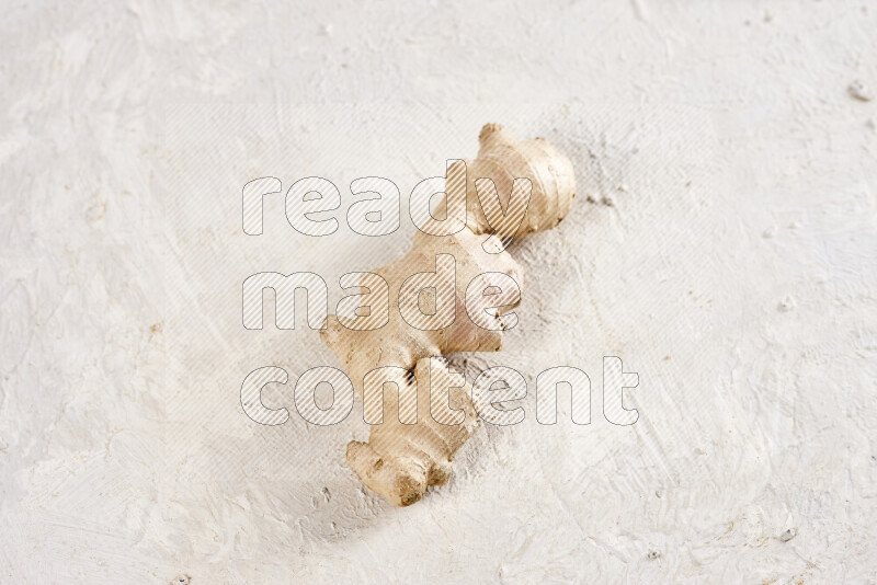 Fresh ginger root on white background