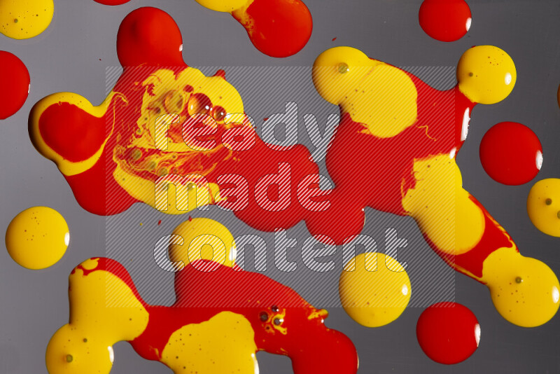 Abstract colorful background with mixed of red and yellow paint colors