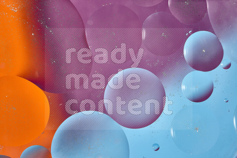 Close-ups of abstract oil bubbles on water surface in shades of blue, orange and purple