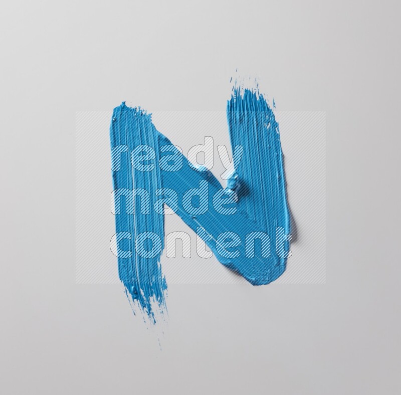 Multi blue straight brush strokes in different shapes on a white background