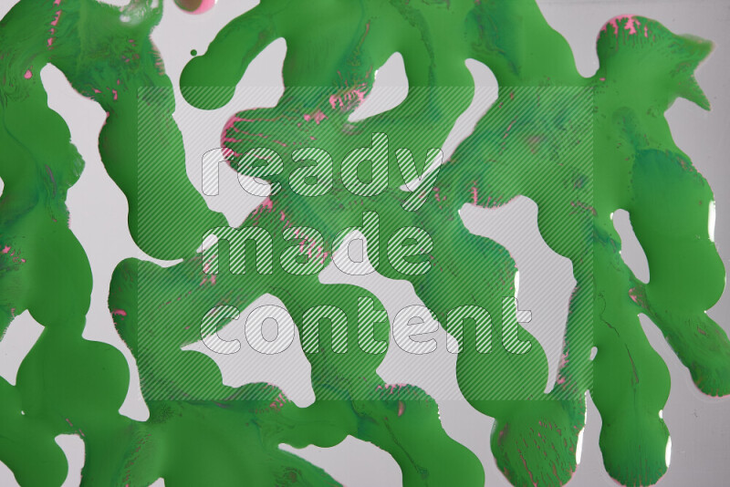 خلفية ملونة مع مزيج من ألوان الطلاء الوردي والأخضر