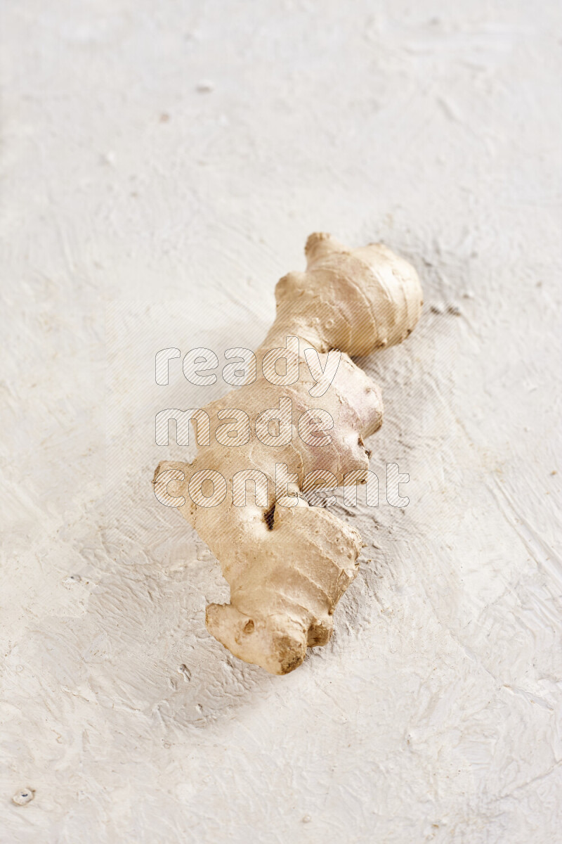 Fresh ginger root on white background