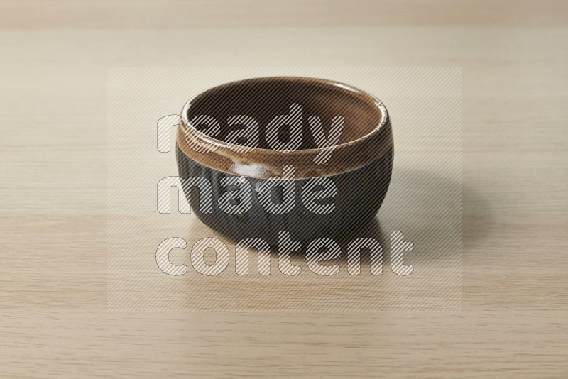 Multicolored Pottery Bowl on Oak Wooden Flooring, 15 degrees