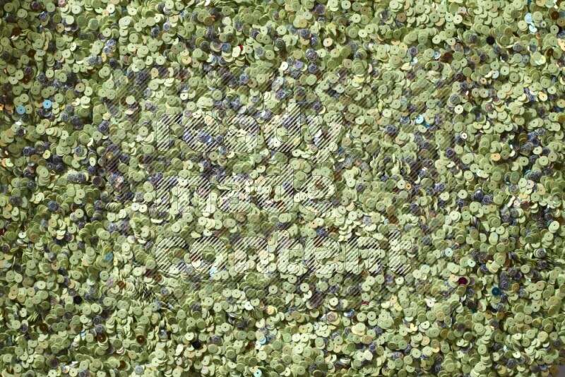 ترتر مسطح متعدد الألوان على خلفية رمادية