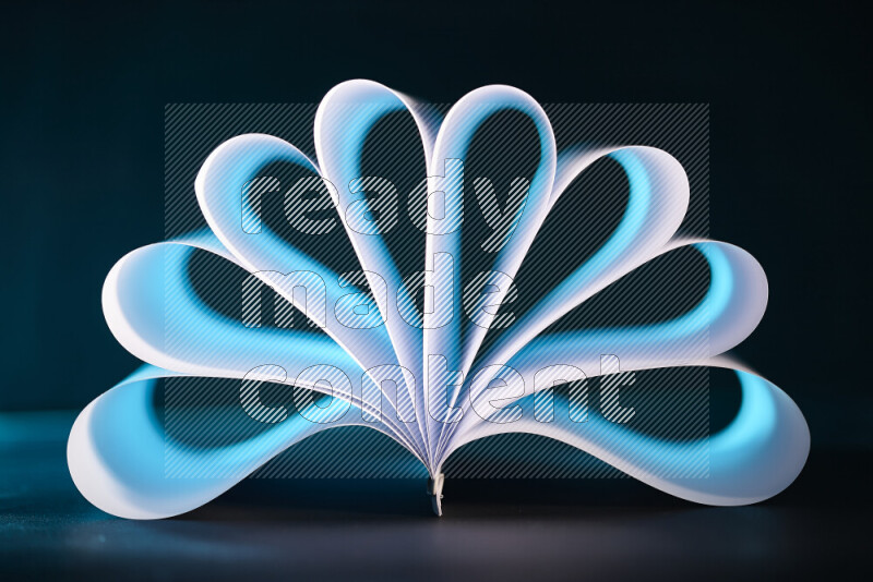 An abstract art piece displaying smooth curves in blue and white gradients created by colored light