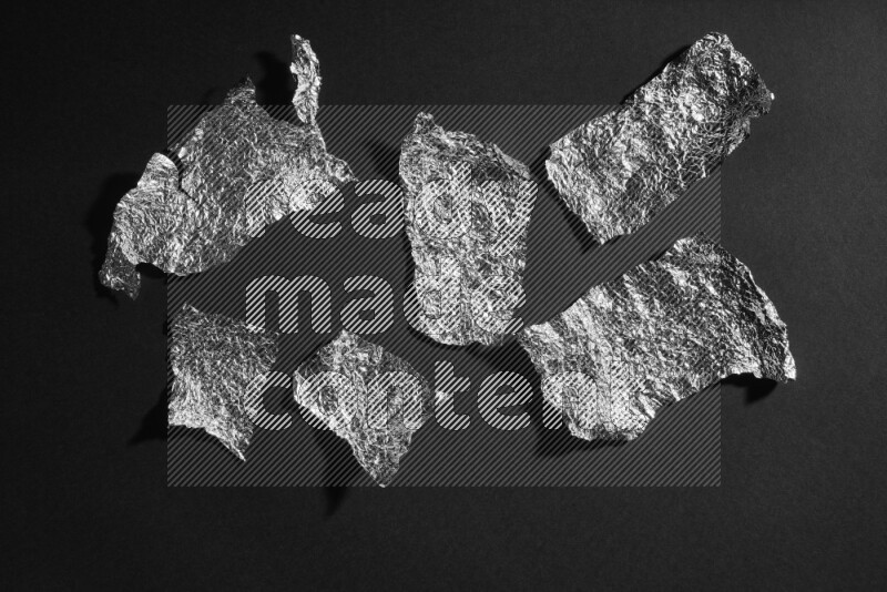 Aluminium foil on black background