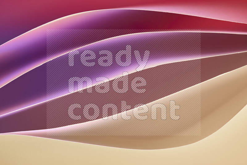 هذه الصورة تعرض تكوين فن الورق التجريدي مع منحنيات ورقية بتدرجات لونية دافئة مختلفة المكونه بواسطة الضوء الملون