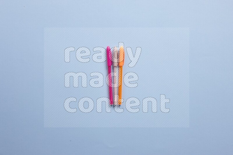 Different school supplies on blue background