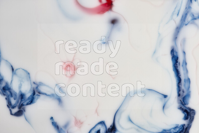 لقطة مقربة لأنماط دوامية باللون الأزرق والأحمر والأبيض