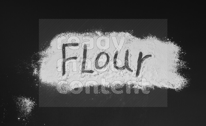 A word written with powder on black background