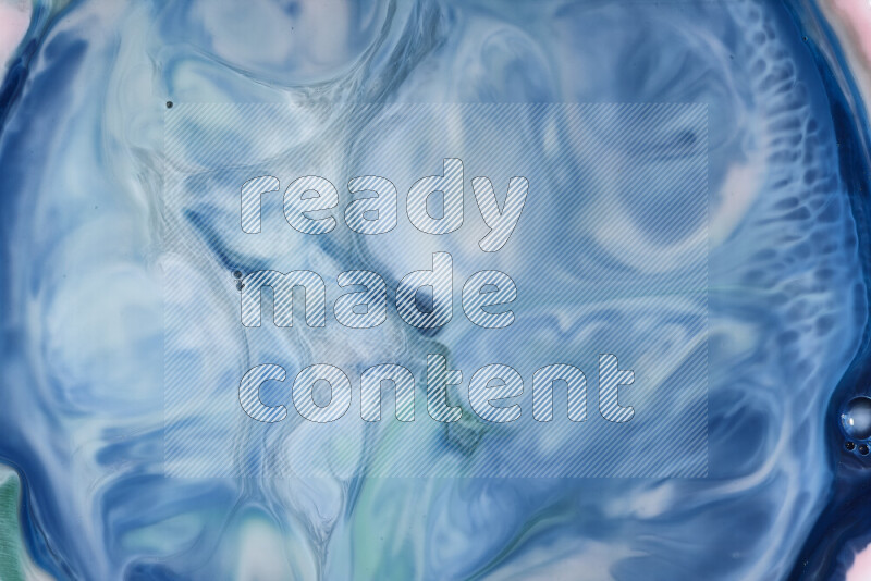 لقطة مقربة لأنماط دوامية باللون الأزرق والأبيض