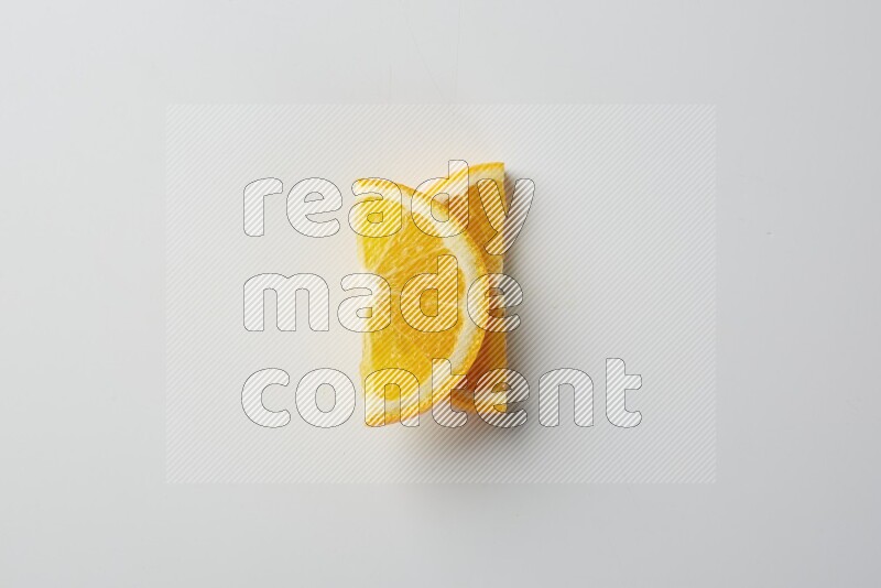 Two halves of an orange slices on white background