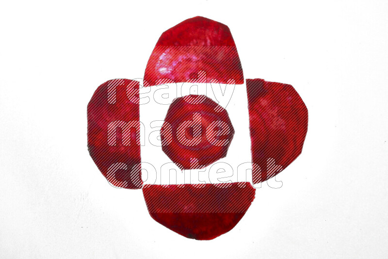 Beet slices on illuminated white background