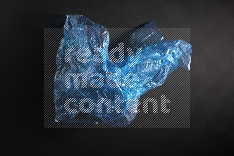 Colored plastic textures on black background