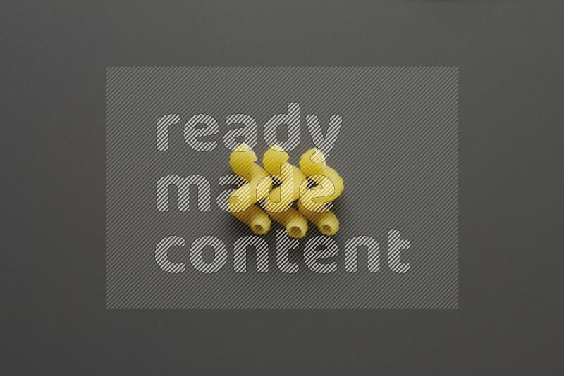 Twist pasta on grey background