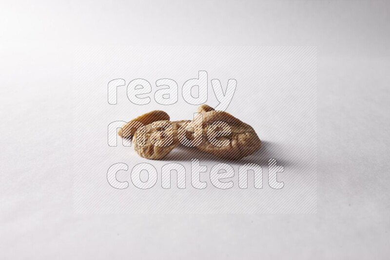 Dried figs on white background