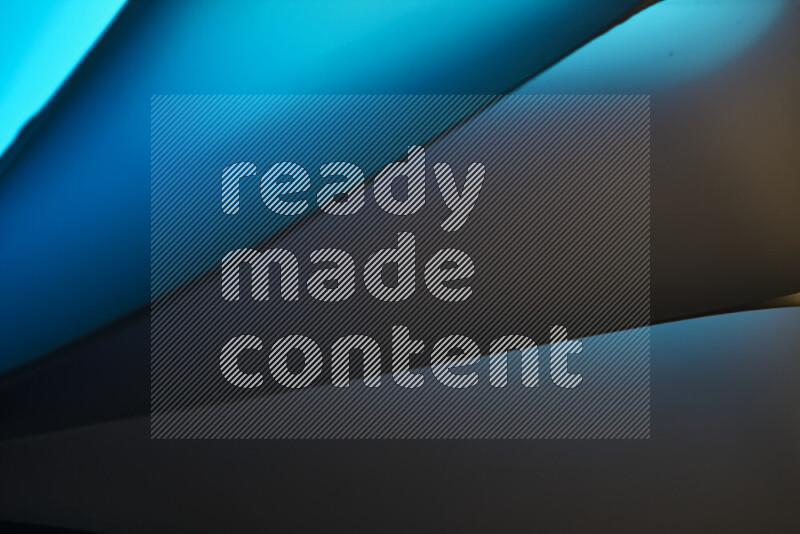 An abstract art piece displaying smooth curves in cold gradients created by colored light